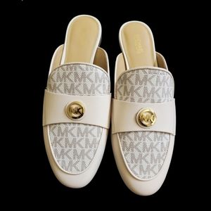 Michael Kors Ashley Mule size 7.5 MK monogram pattern with gold classic MK logo.